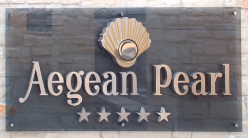 Aegean Pearl Hotel sign